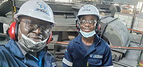 A black engineering Person wearing a protective hat representing our 100% Black Male Owned status